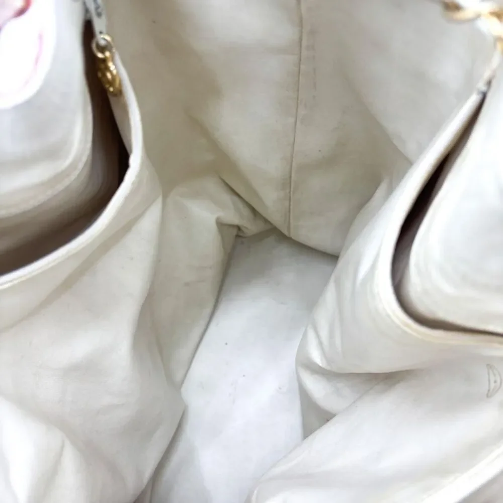 Chanel canvas print chain drawstring bag